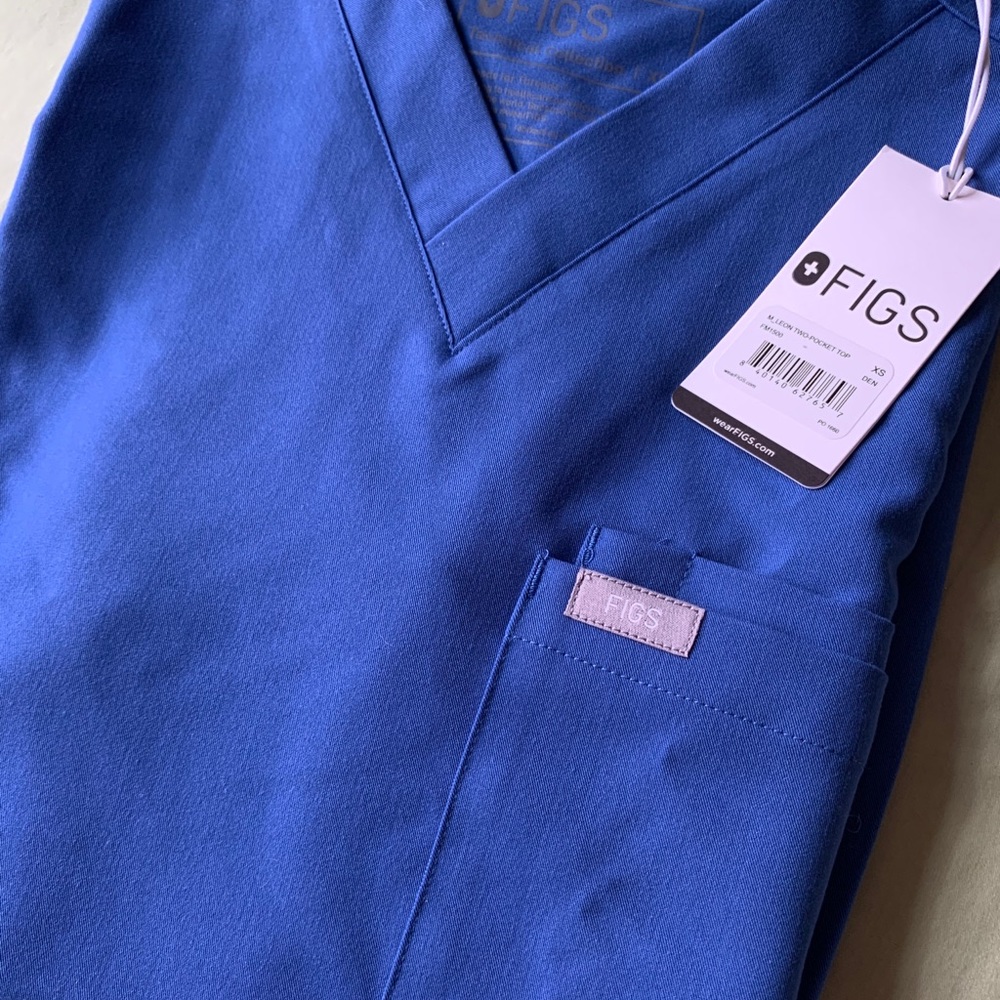 Denim top xs new with original package.